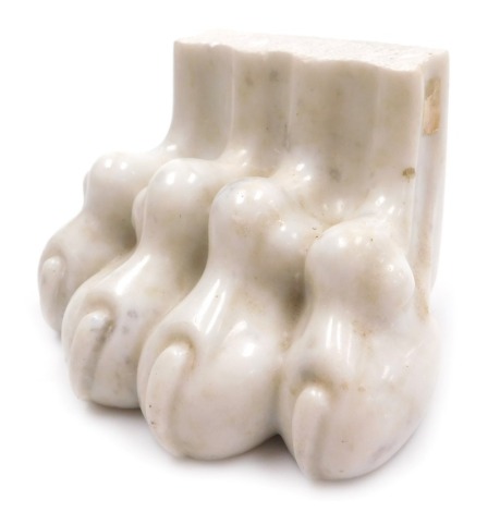 After The Antique. A 19thC Grand Tour white marble carving of a lion's foot, 19cm wide.