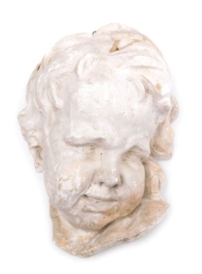 A late 19thC plaster bust of a putto, no. 639, signed to base C.Smith, London, 41cm high.