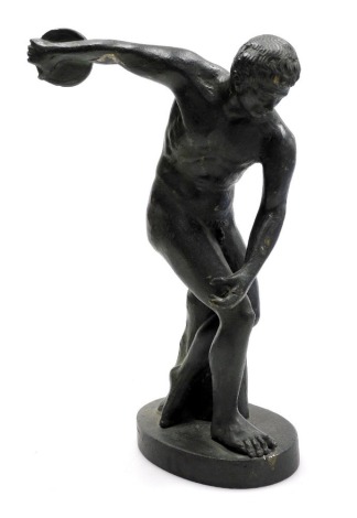 A 19thC Grand Tour patinated bronze figure of Discobolus, raised on an oval base, 25.5cm high.