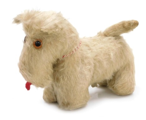 A mid century Pedigree figure of a terrier, bears part label, 26cm wide.