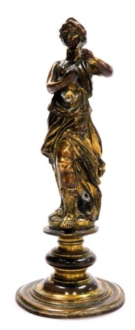 An early 19th gilt bronze figure of a woman, in classical attire, raised on a turned base, 15cm high.