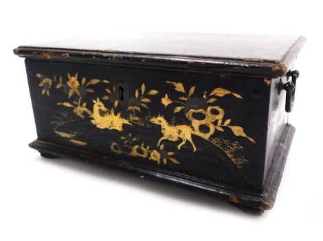 A 19thC Chinese black lacquered box, with a pair of brass swing handles, decorated with flowers, deer and flowers, the hinged lid opening to reveal a vacant interior, raised on bracket feet, 11cm high, 22.5cm wide, 15.5cm deep.