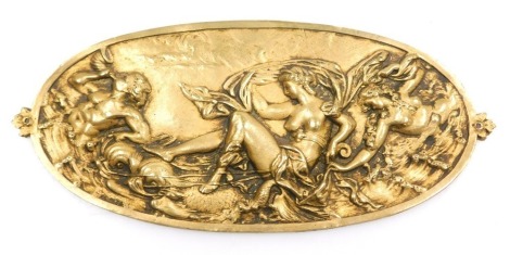 A 19thC gilt bronze oval plaque, embossed with The Venus Marina, being drawn across the ocean by dolphins, flanked by mermaids, 20.5cm wide