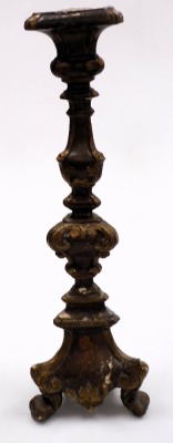 An 18thC European carved and gilt wood altar candlestick, of Baroque form, raised on three scrolled feet, 53cm high. - 2