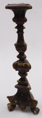 An 18thC European carved and gilt wood altar candlestick, of Baroque form, raised on three scrolled feet, 53cm high. - 3