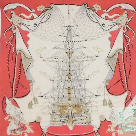 A vintage Thirkell red and cream silk scarf, decorated with a galleon, figureheads and other naval symbols, framed and glazed, 79cm x 78cm.