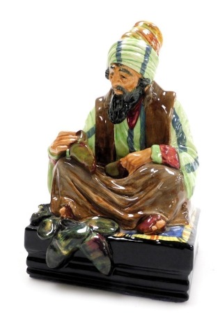 A Royal Doulton figure modelled as The Cobbler, HN1706.