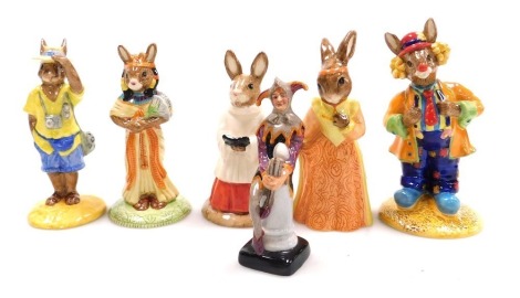 Five Royal Doulton Bunnykins figures, comprising Clarence The Cat, Choir Singer, Tourist, Juliet and Mystic, boxed, 12cm high and Royal Doulton figure The Jester.