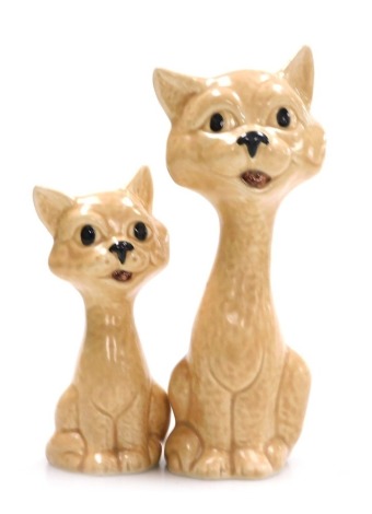 Two Sylvac models of cats, 14cm high, 10cm high respectively.