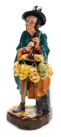 A Royal Doulton figure of The Mask Seller, HN2103, boxed, 22cm high.