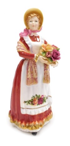 A Royal Doulton Old Country Roses figure, HN3692, modelled by Nadia M Pedley, 1995, boxed, 21cm high.