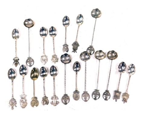 A group of Far Eastern commemorative coffee spoons, with terminals for Johore, Selangor, Penang, Redah, and others, some with floral engraved bowls, white metal, 4.50z. (19)