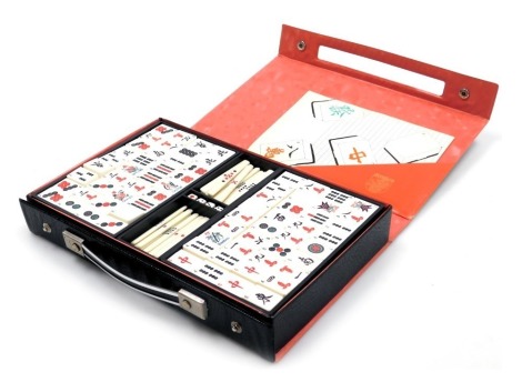 An Argon Mahjong set, cased with instructions.