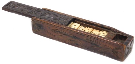 A set of Napoleonic prisoner of war work bone dominoes, in a carved wooden box, 19cm wide.