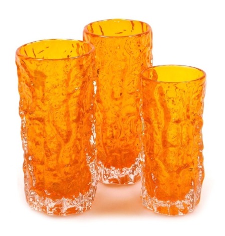 A pair of Whitefriars tangerine bark vases, designed by Jeffrey Baxter, 18cm high, and a smaller vase, 15.5cm high. (3)