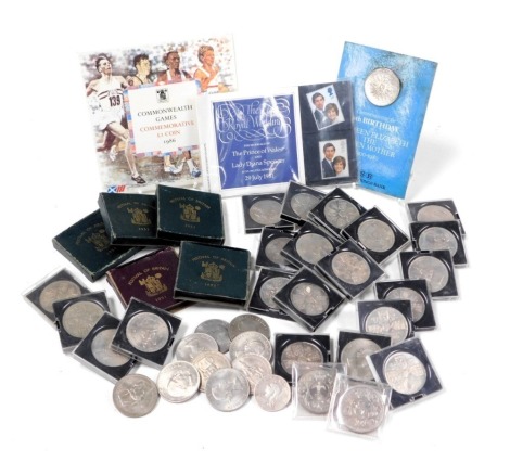 Commemorative crowns, including Festival of Britain 1951, Elizabeth II Coronation crowns, Churchill crowns, together with a Commonwealth Games commemorative two pound coin 1986, and Royal Wedding of The Prince of Wales and Lady Diana Spencer mint stamps.