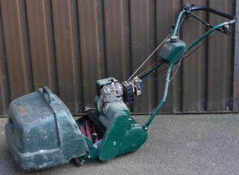 An Atco petrol lawnmower, serial no. 001436A.