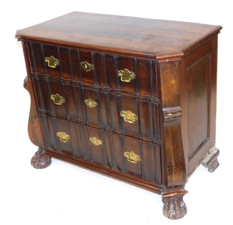 An 18thC Continental bombe chest, of three linen fold graduated long drawers, with corner scroll carving, raised on ball and claw feet, 90cm high, 109cm wide, 55cm deep.