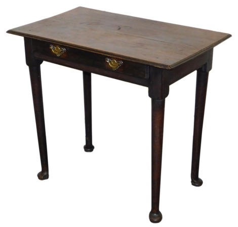 A George III oak side table, with a rectangular top, above a frieze drawer, raised on turned cylindrical legs and pad feet, 70cm high, 79cm wide, 49cm deep.