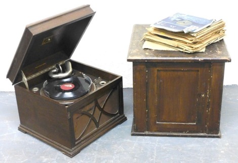 An early 20thC oak His Master's Voice tabletop gramophone, together with a scumbled pine cupboard and a group of 78rpm records.