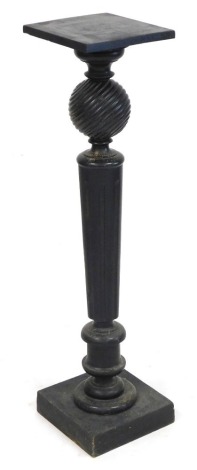 A Victorian ebonised jardiniere stand, with a square top above a turned and spiral fluted ball column, on a square base, 105cm high, 26.5cm diameter.