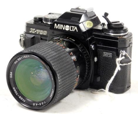 A Minolta X-700 camera, with an auto zoom lens 1:3.5-4.5, serial no 2683783.