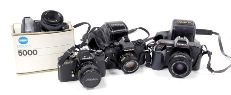 Two Minolta 5000 cameras, one boxed, Minolta XD7 camera, and a Mamiya ZE camera. (4)