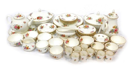 A Royal Worcester part tea, coffee and dinner service decorated in the Roanoke pattern, to include teapot, coffee cans and saucers, teacups and saucers, two lidded tureens, dinner plates, coffee pot, etc. (some pieces AF)