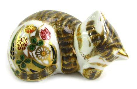 A Royal Crown Derby porcelain paperweight modelled as Cottage Garden Kitten, gold stopper and red printed marks, 5cm high.