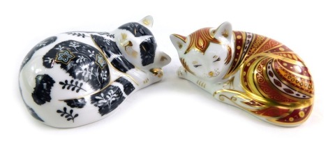 Two Royal Crown Derby cat paperweights, modelled as Marmelo, limited edition number 1649/2500, gold stopper and red printed marks, 9cm wide, and Misty, an exclusive for The Royal Crown Derby Collectors Guild, silver stopper and red printed marks, 9cm wide