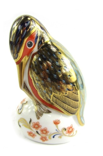 A Royal Crown Derby porcelain paperweight modelled as a kingfisher, gold stopper and red printed marks, 12cm high, boxed.