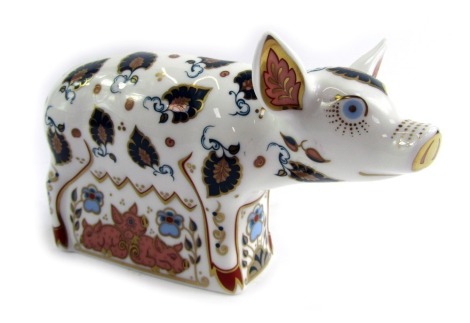 A Royal Crown Derby porcelain paperweight modelled as Priscilla, an exclusive to The Royal Crown Derby Collectors Guild, gold stopper and red printed marks, 10.5cm high, boxed.