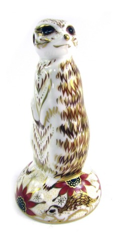 A Royal Crown Derby porcelain paperweight modelled as Meerkat, gold stopper and red printed marks, 13.5cm high, boxed.