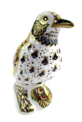 A Royal Crown Derby porcelain paperweight modelled as Song Thrush, gold stopper and red printed marks, 12cm high, boxed.