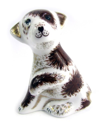 A Royal Crown Derby porcelain paperweight modelled as Bailey Puppy, gold stopper and grey printed marks, 8cm high, boxed.