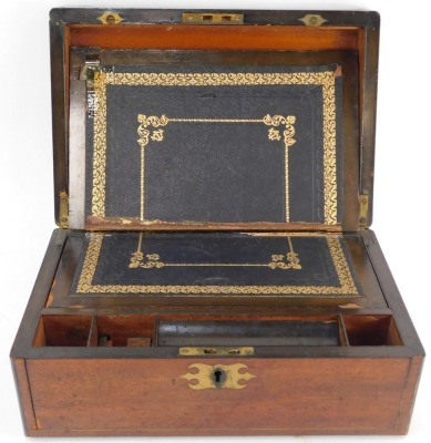 A 19thC mahogany and brass line inlaid writing slope, the hinged lid enclosing a leather inset with gilt tooling, recesses for pens, etc., 15cm high, 35cm wide, 23cm deep. (AF) - 2