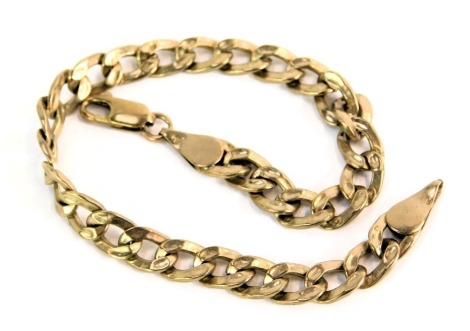 A curb link bracelet, with hammered link, yellow metal stamped 9kt, 20cm long, 5.3g all in.