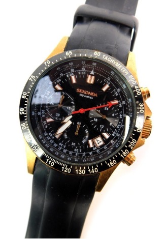 A Sekonda gents chronograph wristwatch, with black dial and red seconds counter, with date aperture and twist stem, on a stainless steel back, on a black rubbed strap, 4cm diameter.