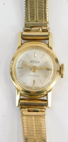 An Arsa Incabloc lady's wristwatch, with a small silvered coloured dial, with incabloc movement, in yellow metal case stamped 14k, serial number 4564, on a gold plated strap, 12.3g all in.