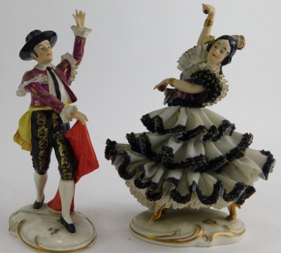 A group of 20thC Continental and other porcelain, to include Dresden crinoline figures, a pair of Capodimonte style figures, pair of Staffordshire cats, 19cm high, porcelain figures of classical ladies, etc. (1 tray). - 2