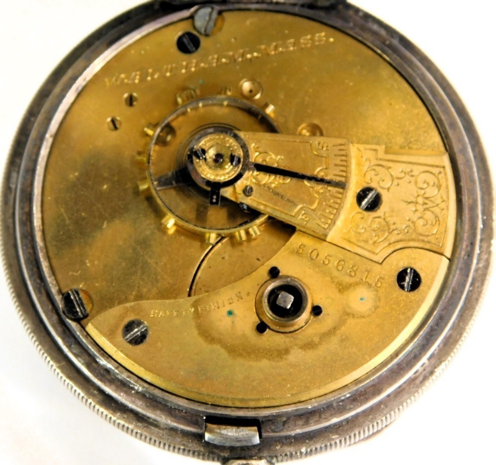 Numeric Watch A Victorian silver pocket watch, with white enamel Roman numeric dial ...
