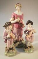 A pair of early 19thC Staffordshire pearl ware figures of a lute player and hurdy gurdy man and an e