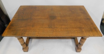 An oak rectangular refectory table, with gouged carved frieze, on turned legs and flat plain stretchers, 76cm high, the top 152cm x 84cm. - 2