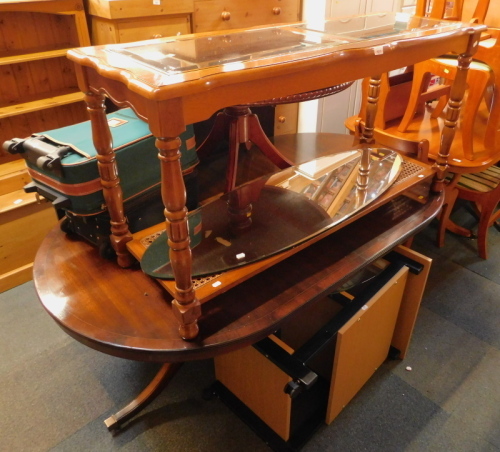 A twin pedestal reproduction dining table, a reproduction console table, oval glass mirror, desk drawer, mahogany low coffee table, and two suitcases. etc. (7)