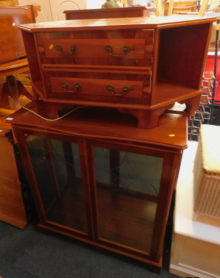 A reproduction two tier glass china cabinet, and a television cabinet. (2)