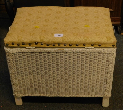 A Lloyd Loom style linen basket, with cushion seat.