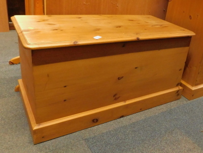 A pine blanket box.