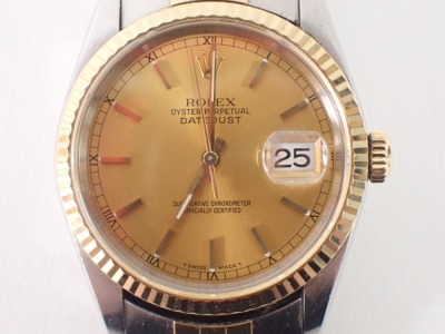 A Rolex gentleman's wristwatch in stainless steel casing, with gold outer border, with date aperture and seconds dial, lugs numbered 455B, boxed with associated paperwork, purchased from Andrew Michaels Jewellers in 2001. - 2