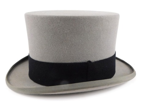 A Locke and Co Hatters grey top hat, size 7, bearing initials RGW, boxed.