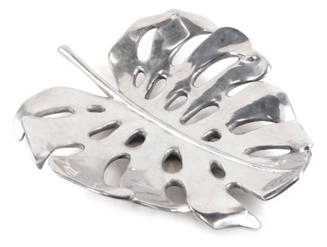 A modern art leaf moulded metal centrepiece, formed as a leaf with pierced decoration, 56cm wide.